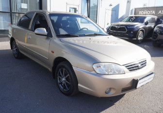 Подержанный автомобиль Kia Spectra Sedan 2009 года (3 фото)