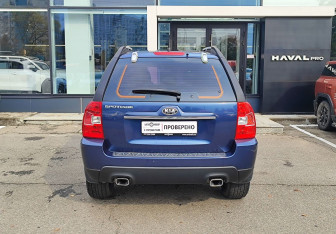 Подержанный автомобиль Kia Sportage 2009 года (6 фото)