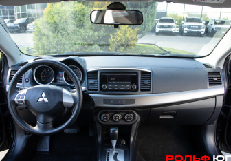Подержанный автомобиль Mitsubishi Lancer Sedan 2014 года (9 фото)