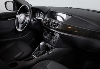 Подержанный автомобиль BMW X1 2012 года (9 фото)