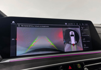 Подержанный автомобиль BMW X7 2021 года (26 фото)