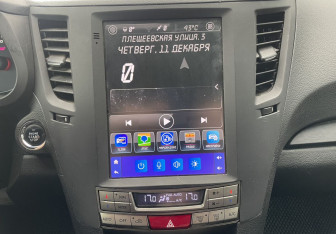 Подержанный автомобиль Subaru Legacy Wagon 2011 года (14 фото)