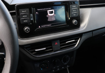 Подержанный автомобиль Skoda Rapid Liftback 2022 года (11 фото)