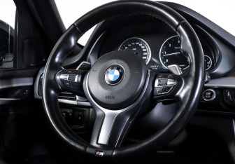 Подержанный автомобиль BMW X5 2014 года (14 фото)