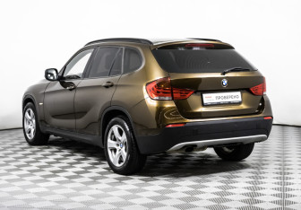 Подержанный автомобиль BMW X1 2011 года (7 фото)