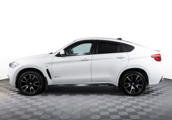 Подержанный автомобиль BMW X6 2018 года (8 фото)