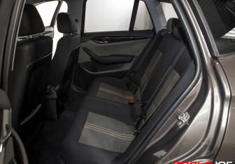 Подержанный автомобиль BMW X1 2012 года (10 фото)