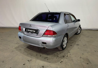 Подержанный автомобиль Mitsubishi Lancer Sedan 2003 года (6 фото)