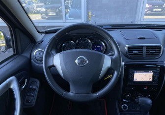 Подержанный автомобиль Nissan Terrano 2016 года (14 фото)
