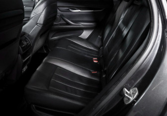 Подержанный автомобиль BMW X6 2016 года (10 фото)