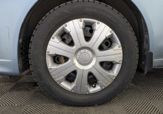 Подержанный автомобиль Mitsubishi Lancer Sedan 2011 года (12 фото)