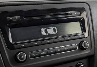 Подержанный автомобиль Skoda Rapid Liftback 2015 года (26 фото)