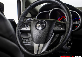 Подержанный автомобиль Mazda CX-7 2011 года (14 фото)