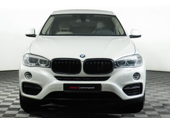 Подержанный автомобиль BMW X6 2015 года (2 фото)
