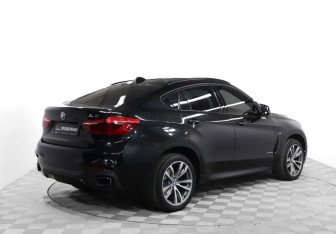Подержанный автомобиль BMW X6 2015 года (5 фото)