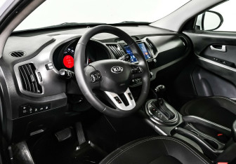 Подержанный автомобиль Kia Sportage 2013 года (9 фото)