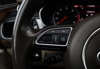 Подержанный автомобиль Audi A7 2016 года (23 фото)