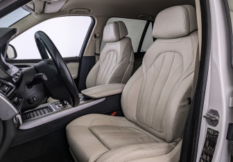 Подержанный автомобиль BMW X5 2014 года (20 фото)