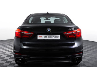 Подержанный автомобиль BMW X6 2016 года (6 фото)