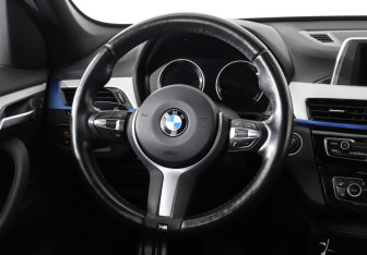 Подержанный автомобиль BMW X1 2018 года (15 фото)