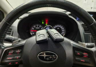 Подержанный автомобиль Subaru XV 2013 года (18 фото)