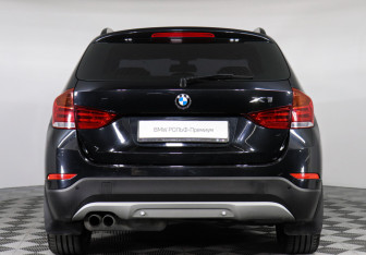 Подержанный автомобиль BMW X1 2014 года (4 фото)