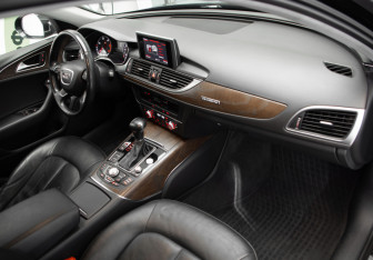 Подержанный автомобиль Audi A6 allroad 2014 года (31 фото)