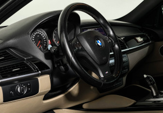 Подержанный автомобиль BMW X6 M 2012 года (11 фото)