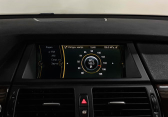 Подержанный автомобиль BMW X6 2014 года (13 фото)