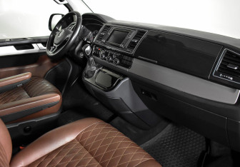 Подержанный автомобиль Volkswagen Multivan 2016 года (10 фото)