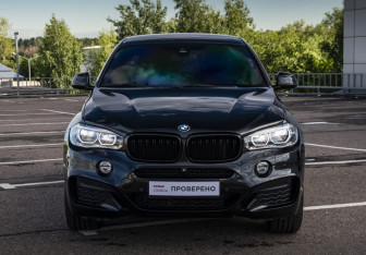 Подержанный автомобиль BMW X6 2018 года (2 фото)