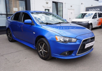 Подержанный автомобиль Mitsubishi Lancer Sedan 2011 года (3 фото)