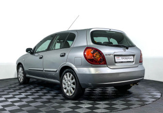 Подержанный автомобиль Nissan Almera Hatchback 2006 года (7 фото)