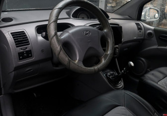 Подержанный автомобиль Hyundai Matrix 2006 года (11 фото)