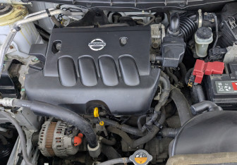 Подержанный автомобиль Nissan X-Trail 2013 года (9 фото)