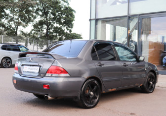 Подержанный автомобиль Mitsubishi Lancer Sedan 2005 года (4 фото)