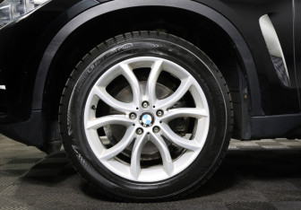 Подержанный автомобиль BMW X6 2015 года (25 фото)