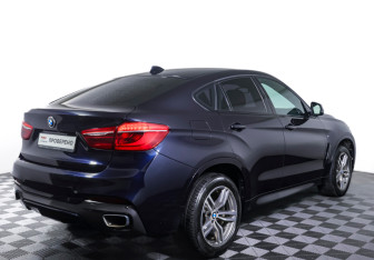 Подержанный автомобиль BMW X6 2016 года (5 фото)