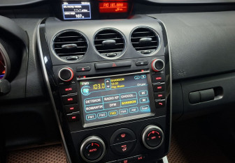 Подержанный автомобиль Mazda CX-7 2011 года (14 фото)