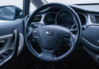 Подержанный автомобиль Kia Ceed Wagon 2015 года (15 фото)