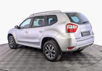 Подержанный автомобиль Nissan Terrano 2014 года (7 фото)