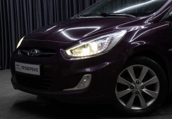 Подержанный автомобиль Hyundai Solaris Sedan 2013 года (18 фото)