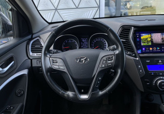 Подержанный автомобиль Hyundai Santa Fe 2014 года (14 фото)