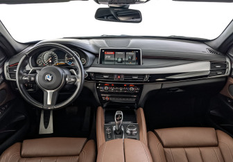 Подержанный автомобиль BMW X6 2018 года (14 фото)