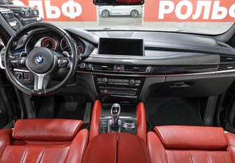 Подержанный автомобиль BMW X6 2017 года (15 фото)