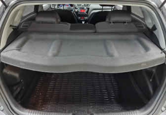 Подержанный автомобиль Kia Rio Hatchback 2012 года (10 фото)