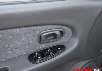 Подержанный автомобиль Kia Spectra Sedan 2006 года (13 фото)