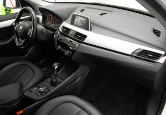 Подержанный автомобиль BMW X1 2015 года (29 фото)