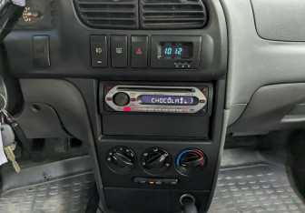 Подержанный автомобиль Kia Spectra Sedan 2007 года (20 фото)