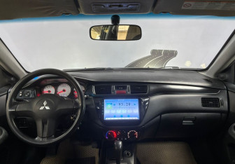 Подержанный автомобиль Mitsubishi Lancer Sedan 2009 года (12 фото)